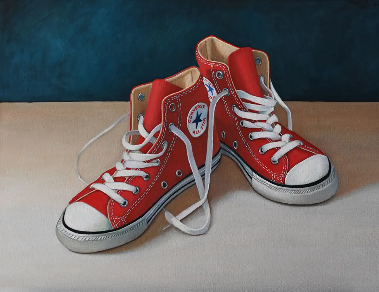 Red Converse All Star sneakers displayed at the Threshold Exhibition.